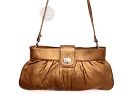 Vogue Crafts and Designs Pvt. Ltd. manufactures Popular Golden Sling Bag at wholesale price.
